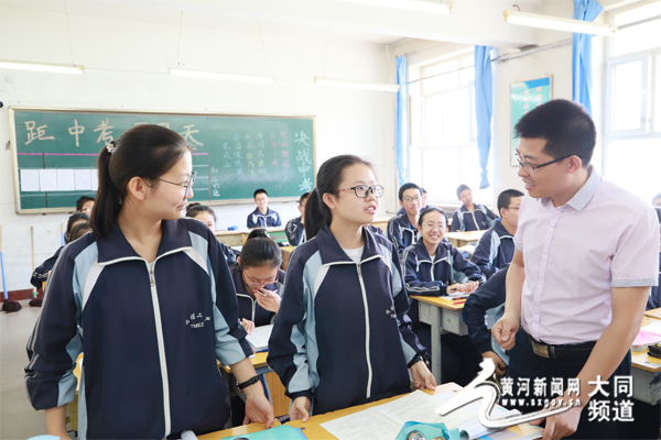 庞君伟"让学生因我的存在而感到幸福"